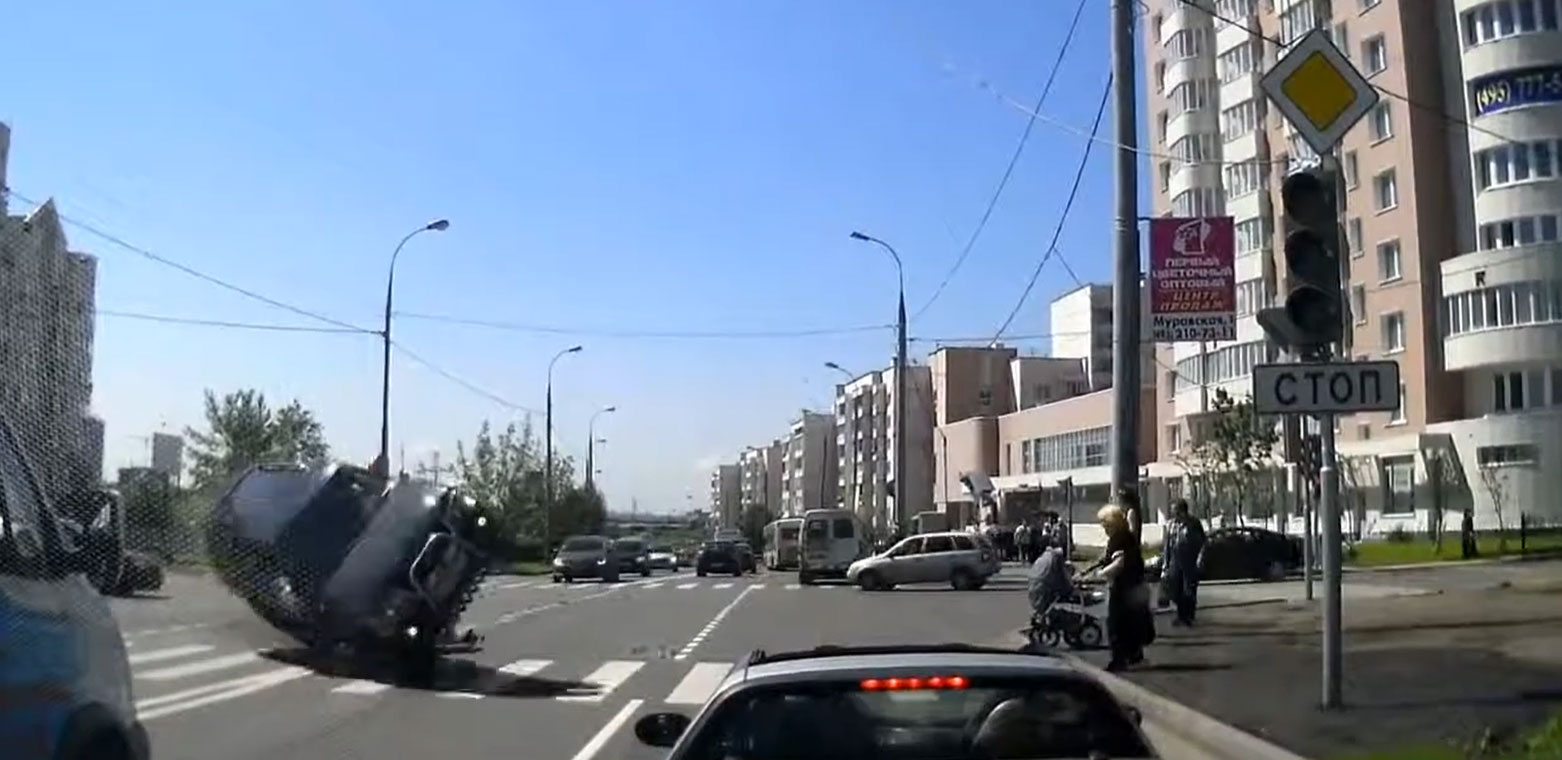 SUV Rolls Over & Strikes Dash Cam Vehicle