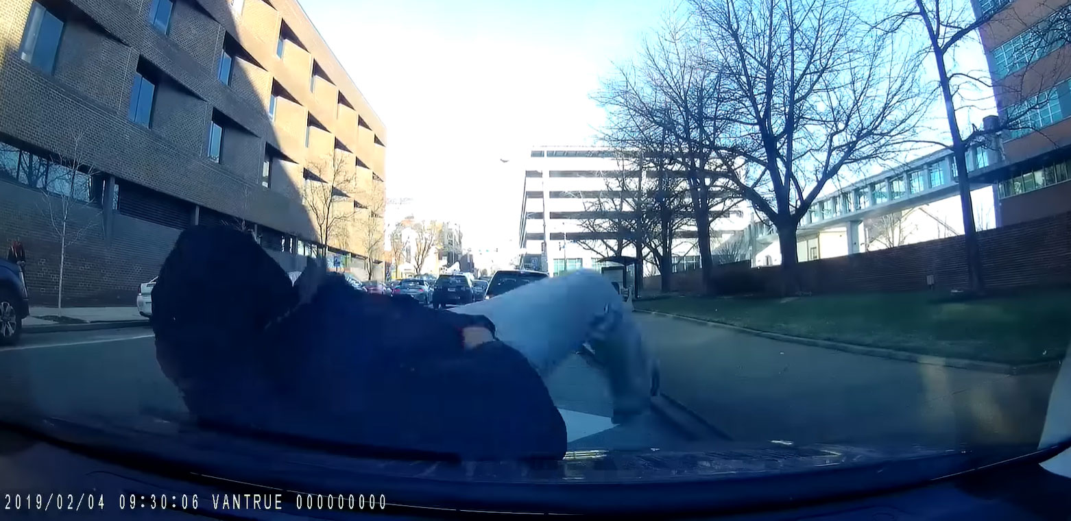 Insurance Scammer Jumps on Car, Foiled By Dash Cam