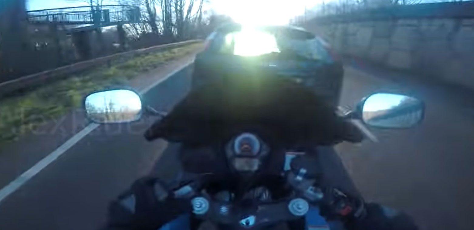Motorcyclist Rear-Ends Car after Being Blinded by the Sun