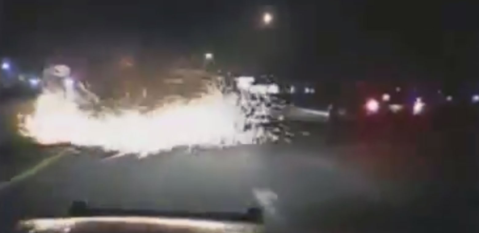 Police Dash Cam Catches SUV Rollover Accident