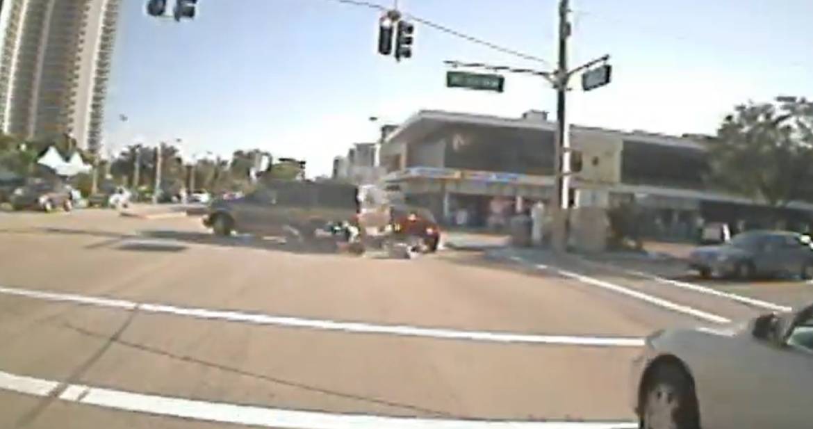 Motorcyclist Runs Red Light & T-Bones Car